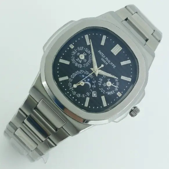 Silver Patek Philippe watch with a blue face on a white background