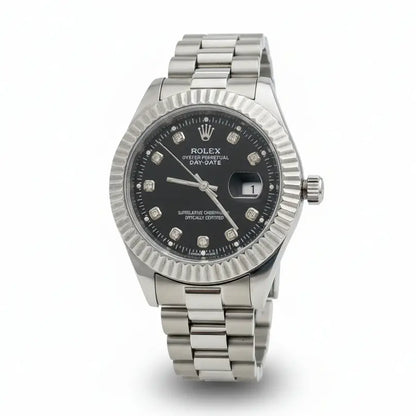 Silver Rolex watch with a black face on a white background