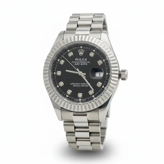 Silver Rolex watch with a black face on a white background