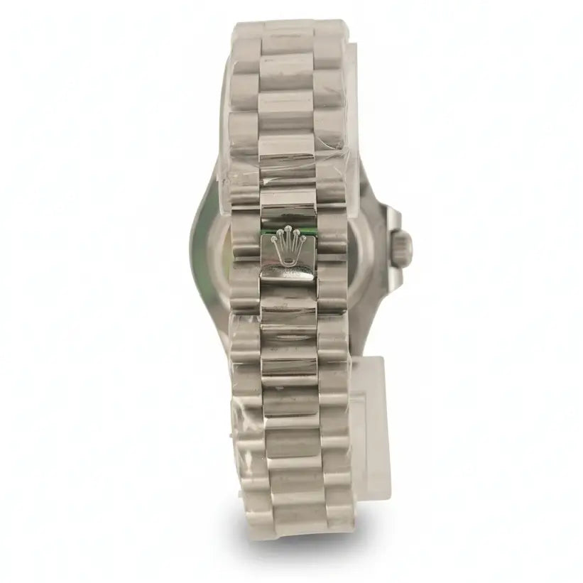 Silver watch with a detailed band on a white background